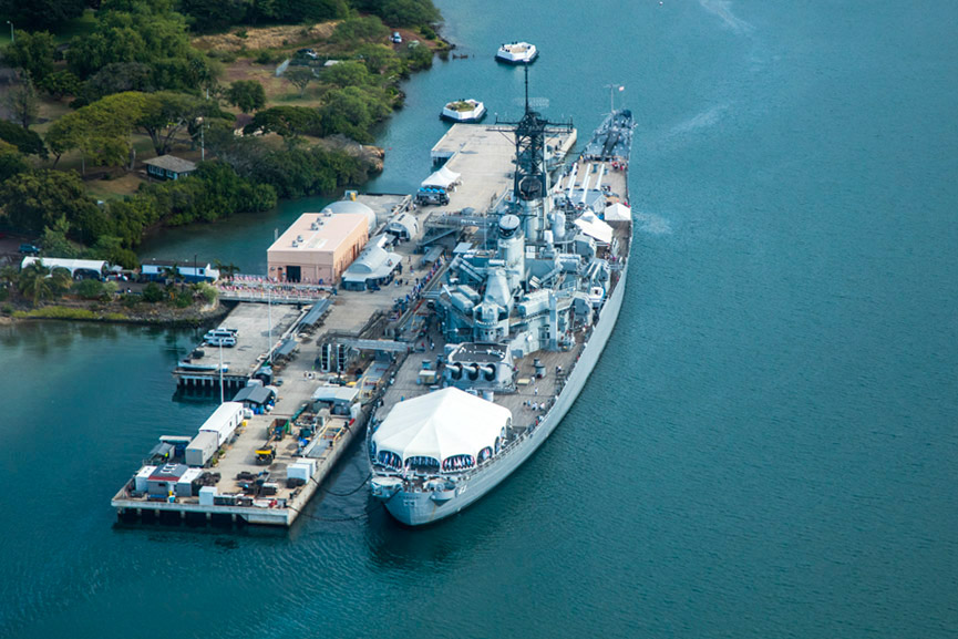 Ship docked in Pearl Harbor seen from a Rainbow Helicopter tour