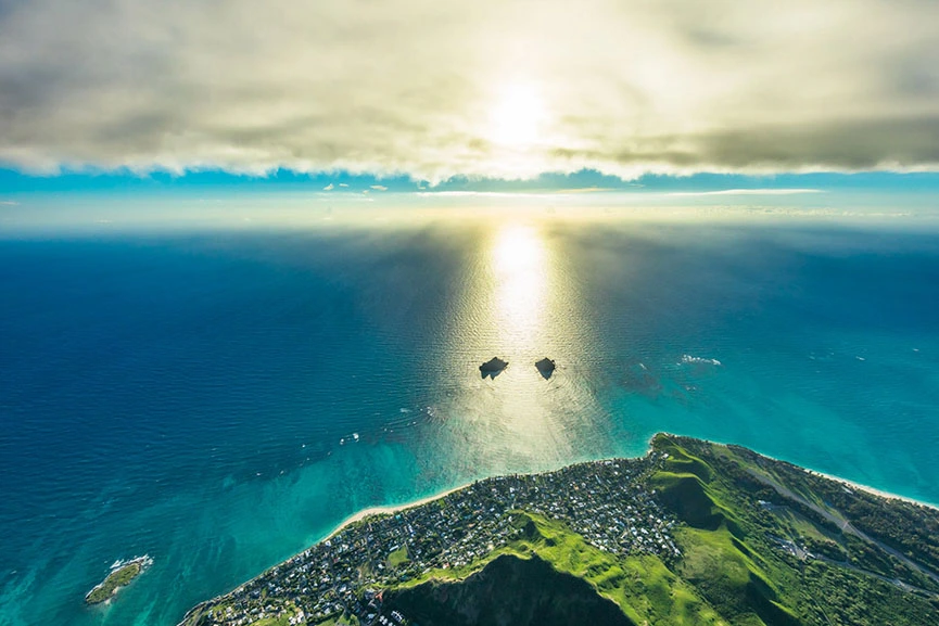 View of Oahu from helicopter with spectacular sunset