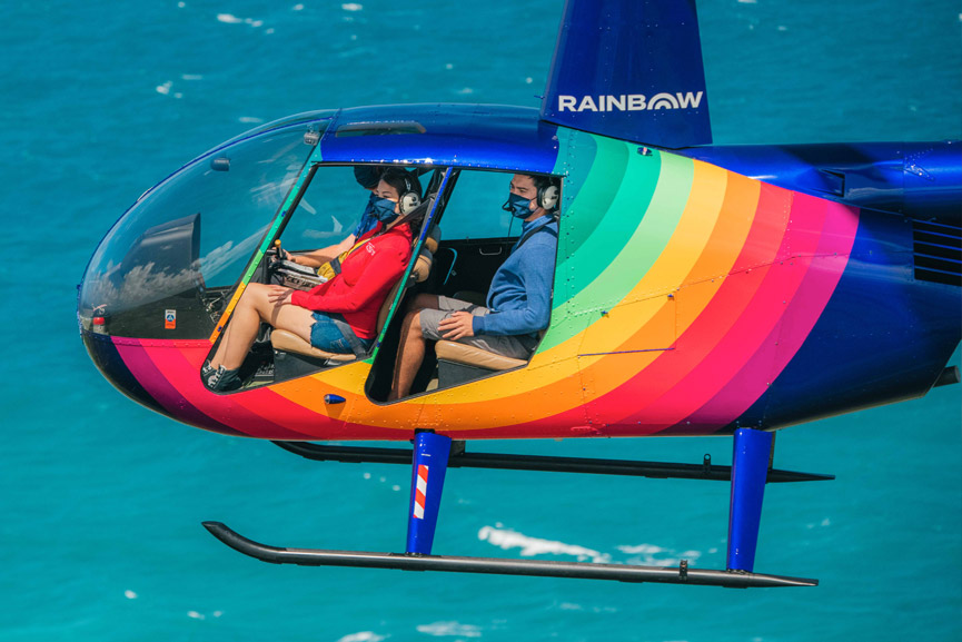 People in a Rainbow Helicopters Doors Off Helicopter Tour