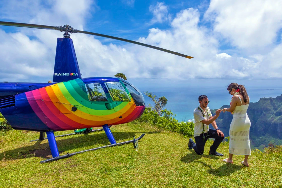 Oahu Helicopter Tours | Rainbow Helicopter landed on cliff