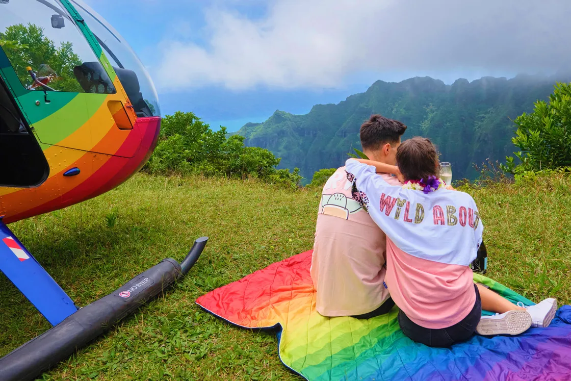 Rainbow Helicopter epic landing on island of Oahu with couple having champagne toast.