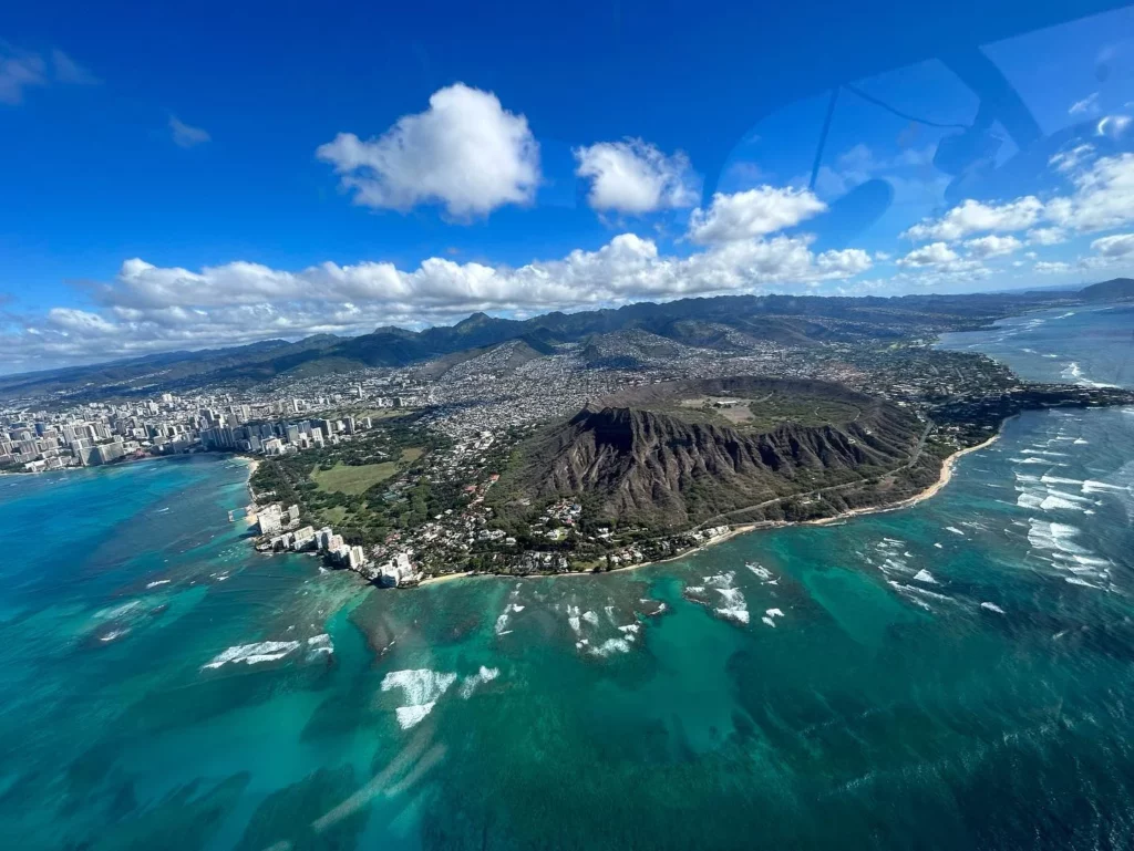 Aerial view of Oahu from the Pacific Ocean, shot by helicopter