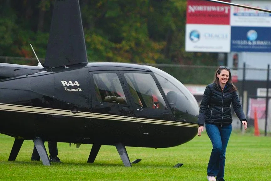Rainbow Helicopters CEO Nicole Battjes lands at Northwest high school in Michigan.