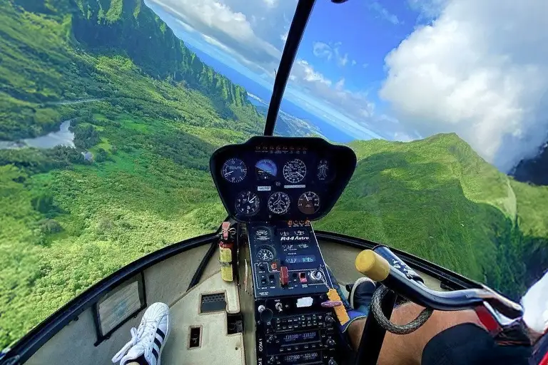 Inside a Rainbow Helicopters flight over Oahu’s green mountain ridges with clear winter visibility.”