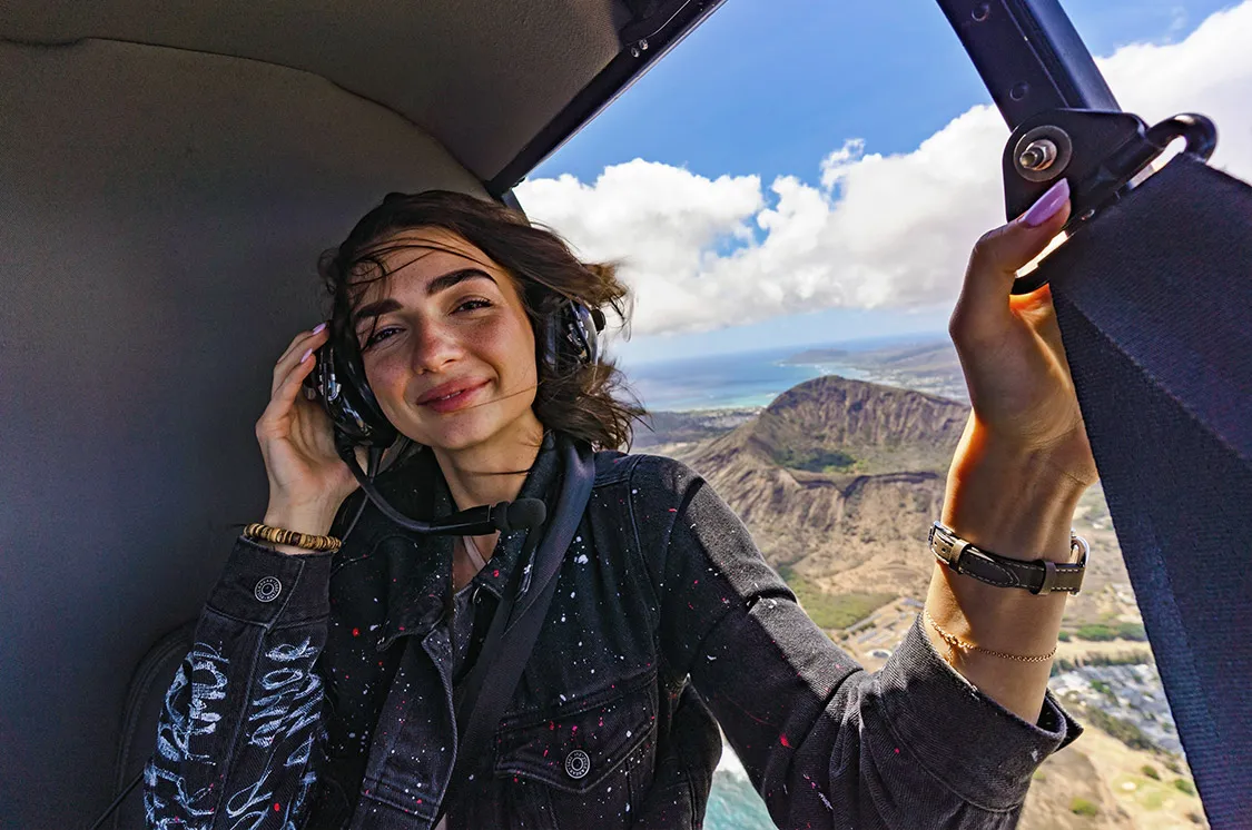 Waikiki Helicopter Tours flying with doors off over Oahu