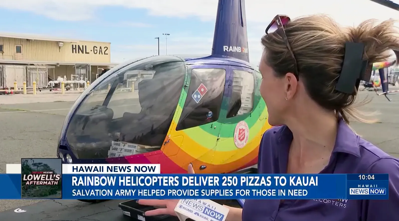 Pizzas loaded onto a Rainbow Helicopters aircraft in Honolulu for the Hurricane Lowell relief flight to Kauai