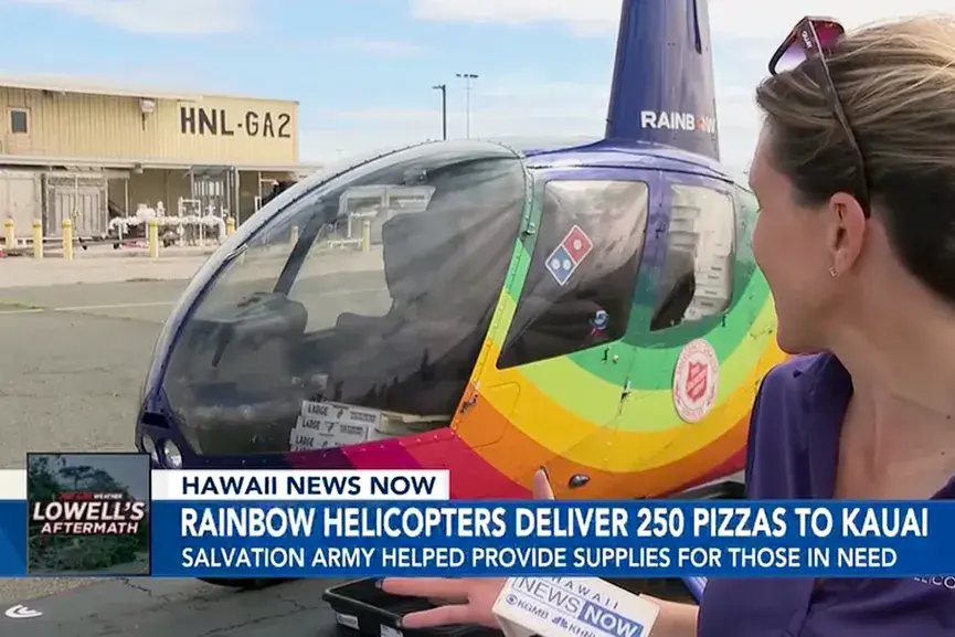 Pizzas loaded onto a Rainbow Helicopters aircraft in Honolulu for the Hurricane Lowell relief flight to Kauai